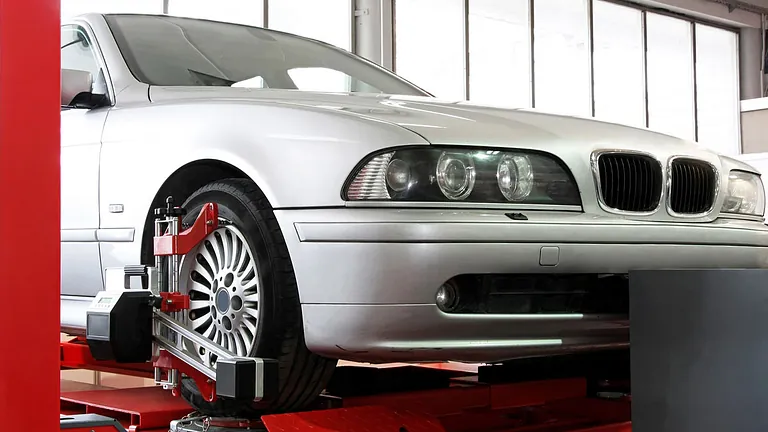 A car on a lift ready for a M.O.T